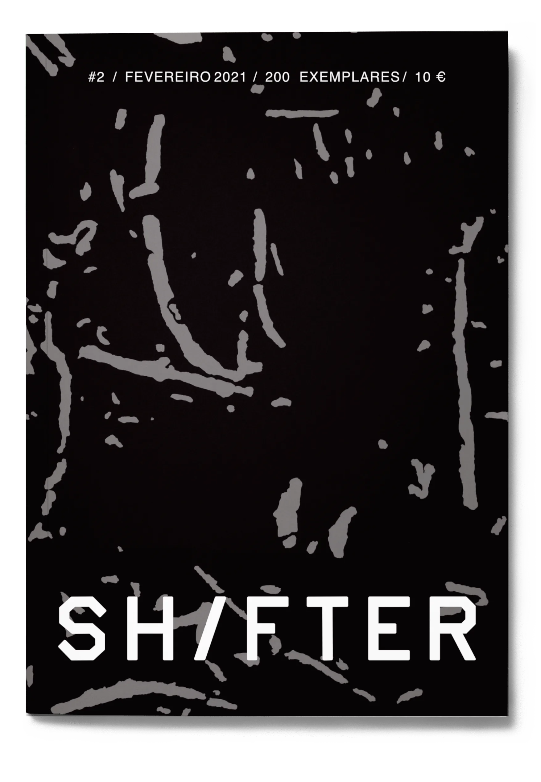 Capa da Revista #2 - Uma obra de Pedro Matos em que se vê uma superficie ssólida, preta, com algumas inscrições abstractas gravadas.